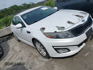 2015 Kia Optima LX z VIN 5XXGM4A76FG399865, wystawiony jako IAAI lot #42312813 z przebiegiem 207 747 mil mil oraz . Historia ofert i sprzedaży dostępna na DreamBid. Obrazek 1.