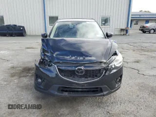 2015 Mazda CX-5 Grand Touring with VIN JM3KE4DY2F0480639, listed as a Copart auction lot 75248594 with 104,652 mi miles and Non Repairable. Bid and sale history available at carsss.com. Image 5.