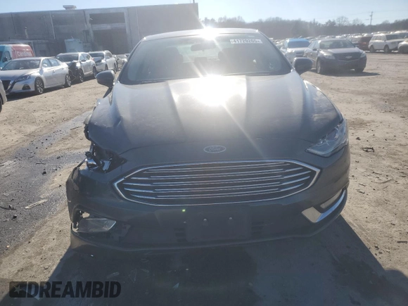 2017 Ford Fusion S with VIN 3FA6P0G76HR201606, listed as a Copart auction lot 41729265 with 124,475 mi miles and Salvage Title. Bid and sale history available at DreamBid. Image 5.
