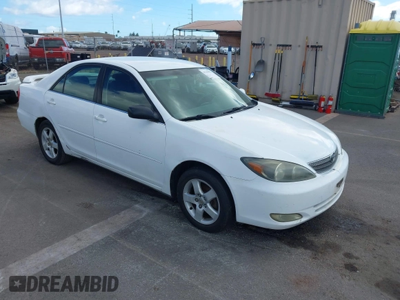 2002 Toyota Camry LE z VIN JTDBE32K020030113, wystawiony jako IAAI lot #41210452 z przebiegiem 190 486 mil mil oraz . Historia ofert i sprzedaży dostępna na DreamBid. Obrazek 1.