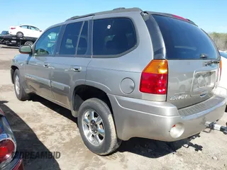 2002 GMC Envoy SLT with VIN 1GKDS13S622158143, listed as a IAAI auction lot 41886178 with 217,310 mi miles. Bid and sale history available at carsss.com. Image 3.