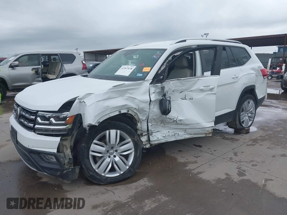 2019 Volkswagen Atlas SE z VIN 1V2WR2CA9KC593891, wystawiony jako IAAI lot #41947078 z przebiegiem 74 525 mil mil oraz . Historia ofert i sprzedaży dostępna na DreamBid. Obrazek 6.