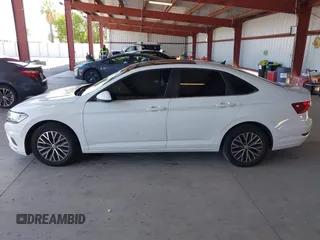 2019 Volkswagen Jetta S с VIN 3VWC57BU1KM249749, выставлен на аукционе IAAI как лот 42332100 с пробегом 128 620 миль миль и . История ставок и продаж доступна на DreamBid. Изображение 14.
