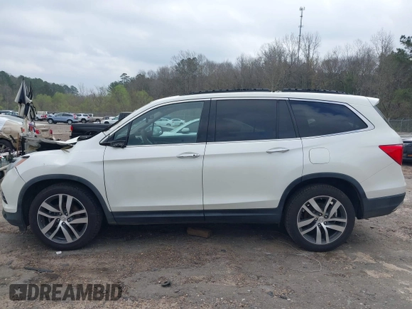 2017 Honda Pilot Elite with VIN 5FNYF6H04HB042192, listed as a IAAI auction lot 41780875 with 158,491 mi miles and . Bid and sale history available at DreamBid. Image 14.