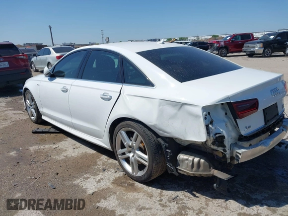 2016 Audi A6 2.0T Premium Plus with VIN WAUGFAFC4GN045229, listed as a IAAI auction lot 41974532 with 122,585 mi miles. Bid and sale history available at carsss.com. Image 3.