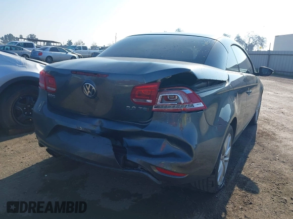 2015 Volkswagen Eos Komfort with VIN WVWBW8AH7FV004228, listed as a IAAI auction lot 41659825 with 71,468 mi miles and . Bid and sale history available at DreamBid. Image 4.