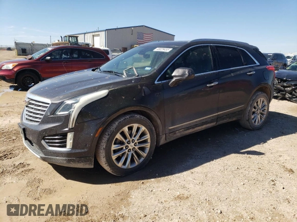 2017 Cadillac XT5 Platinum AWD z VIN 1GYKNFRS6HZ138810, wystawiony jako Copart lot #48029455 z przebiegiem 97 948 mil mil oraz Szkoda całkowita • Salvage title. Historia ofert i sprzedaży dostępna na DreamBid. Obrazek 1.