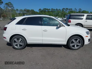 2015 Audi Q3 Premium Plus with VIN WA1EFCFS7FR010697, listed as a IAAI auction lot 41948566 with 167,001 mi miles and . Bid and sale history available at DreamBid. Image 13.