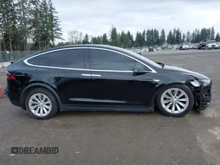 2016 Tesla Model X 70D with VIN 5YJXCBE20GF013046, listed as a IAAI auction lot 41944005 with 94,509 mi miles. Bid and sale history available at carsss.com. Image 13.