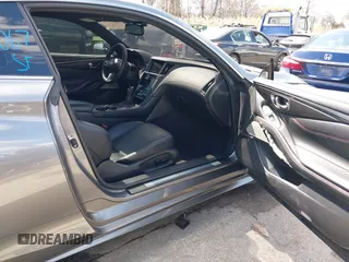 2021 Infiniti Q60 Red Sport 400 with VIN JN1FV7LLXMM560314, listed as a IAAI auction lot 41930067 with 47,818 mi miles and . Bid and sale history available at DreamBid. Image 5.