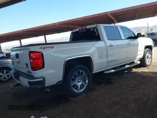 2014 Chevrolet Silverado 1500 High Country with VIN 3GCUKTEC2EG269961, listed as a IAAI auction lot 42054082 with 165,209 mi miles and . Bid and sale history available at DreamBid. Image 4.