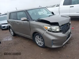 2011 Scion xB with VIN JTLZE4FE9B1141752, listed as a IAAI auction lot 41797088 with 114,357 mi miles. Bid and sale history available at carsss.com. Image 1.