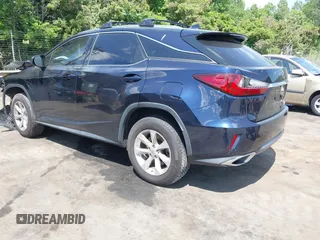 2016 Lexus RX 350 with VIN JTJBZMCA2G2001429, listed as a IAAI auction lot 42202436 with Not provided miles and . Bid and sale history available at DreamBid. Image 3.