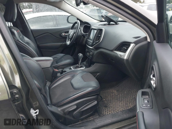 2015 Jeep Cherokee Trailhawk with VIN 1C4PJMBB5FW510514, listed as a IAAI auction lot 41492111 with 98,482 mi miles and . Bid and sale history available at DreamBid. Image 5.