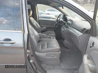 2010 Honda Odyssey EX-L with VIN 5FNRL3H70AB074913, listed as a IAAI auction lot 40142162 with 210,771 mi miles and . Bid and sale history available at DreamBid. Image 5.
