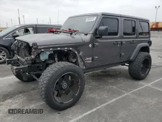 2019 Jeep Wrangler Unlimited Sport S with VIN 1C4HJXDG5KW535115, listed as a Copart auction lot 58404545 with 95,491 mi miles and Salvage title. Bid and sale history available at DreamBid. Image 1.