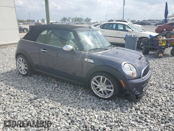 2012 MINI Convertible S with VIN WMWZP3C56CT250886, listed as a Copart auction lot 50027405 with 92,990 mi miles and Salvage title. Bid and sale history available at DreamBid. Image 4.