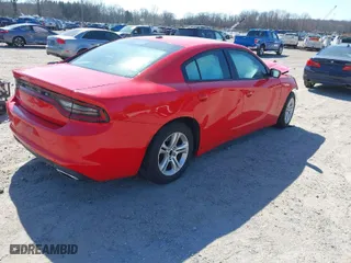 2020 Dodge Charger SXT with VIN 2C3CDXBG2LH140513, listed as a IAAI auction lot 41770400 with 85,734 mi miles. Bid and sale history available at carsss.com. Image 4.
