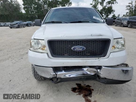 2005 Ford F-150 STX with VIN 1FTRX14W35FB76018, listed as a Copart auction lot 54075785 with 209,176 mi miles and Salvage Title. Bid and sale history available at carsss.com. Image 5.