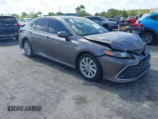 2023 Toyota Camry LE z VIN 4T1C11AK2PU080805, wystawiony jako IAAI lot #42165528 z przebiegiem 28 307 mil mil oraz . Historia ofert i sprzedaży dostępna na DreamBid. Obrazek 1.