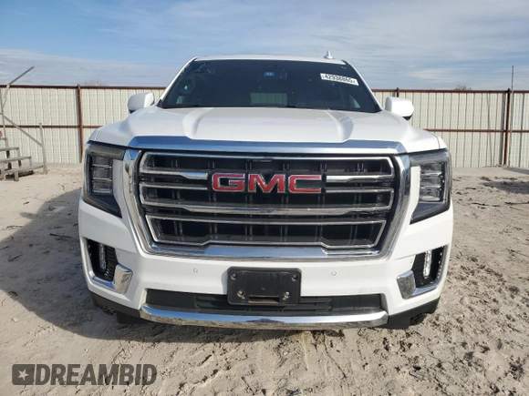 2022 GMC Yukon SLT with VIN 1GKS2BKD4NR349751, listed as a Copart auction lot 42938865 with 55,856 mi miles and Salvage Title. Bid and sale history available at carsss.com. Image 5.