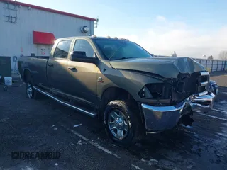2015 Ram 2500 Tradesman z VIN 3C6UR5HL3FG629072, wystawiony jako IAAI lot #41296490 z przebiegiem 211 318 mil mil oraz . Historia ofert i sprzedaży dostępna na DreamBid. Obrazek 1.