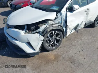 2018 Toyota C-HR XLE with VIN JTNKHMBX3J1011066, listed as a IAAI auction lot 41902651 with 66,874 mi miles. Bid and sale history available at carsss.com. Image 6.