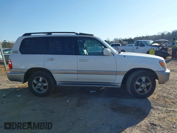 2005 Toyota Land Cruiser z VIN JTEHT05J952078683, wystawiony jako IAAI lot #41769150 z przebiegiem 299 737 mil mil oraz . Historia ofert i sprzedaży dostępna na DreamBid. Obrazek 13.