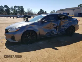 2020 Nissan Maxima SR with VIN 1N4AA6EV7LC379595, listed as a Copart auction lot 46549435 with 67,215 mi miles and Salvage Title. Bid and sale history available at DreamBid. Image 1.
