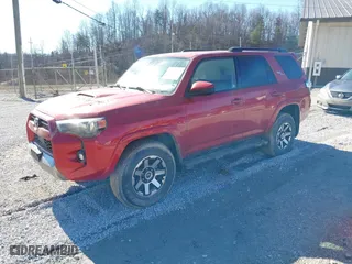 2022 Toyota 4Runner TRD Off Road with VIN JTEPU5JR1N6073522, listed as a IAAI auction lot 41617512 with 52,435 mi miles. Bid and sale history available at carsss.com. Image 2.