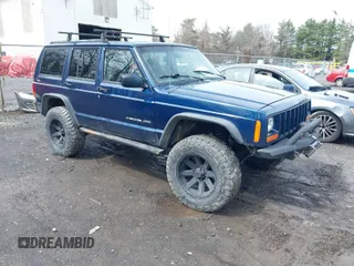 2000 Jeep Cherokee Classic with VIN 1J4FF58SXYL163514, listed as a IAAI auction lot 41920054 with 259,677 mi miles. Bid and sale history available at carsss.com. Image 1.