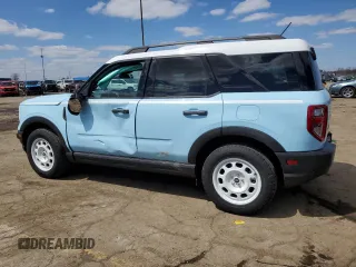 2023 Ford Bronco Sport Heritage z VIN 3FMCR9G60PRE03466, wystawiony jako Copart lot #52785525 z przebiegiem 26 174 mil mil oraz Czysty tytuł • Clean title. Historia ofert i sprzedaży dostępna na DreamBid. Obrazek 2.