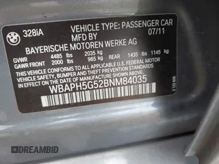 2011 BMW 3 Series 328i with VIN WBAPH5G52BNM84035, listed as a IAAI auction lot 42046301 with 165,418 mi miles. Bid and sale history available at carsss.com. Image 9.