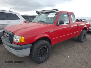 2005 Ford Ranger XL with VIN 1FTYR15E95PA58593, listed as a IAAI auction lot 41706058 with 129,282 mi miles. Bid and sale history available at carsss.com. Image 2.