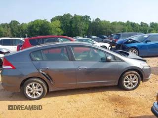 2010 Honda Insight EX with VIN JHMZE2H74AS027020, listed as a IAAI auction lot 42394875 with 248,003 mi miles and . Bid and sale history available at DreamBid. Image 13.