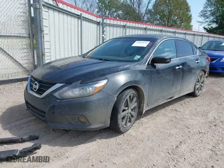 2017 Nissan Altima 2.5 SR with VIN 1N4AL3AP4HC210321, listed as a IAAI auction lot 41883034 with 139,364 mi miles. Bid and sale history available at carsss.com. Image 17.