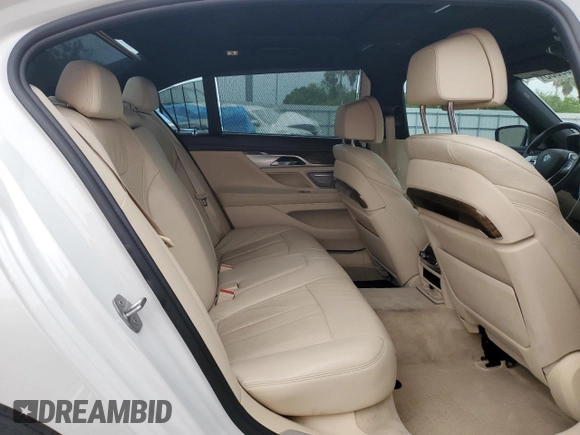2016 BMW 7 Series 740i with VIN WBA7E2C52GG547112, listed as a Copart auction lot 63069355 with 76,867 mi miles and Salvage title. Bid and sale history available at DreamBid. Image 10.