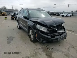 2012 Volkswagen Tiguan SE with VIN WVGAV7AX2CW535869, listed as a Copart auction lot 50589445 with 114,978 mi miles and Salvage Title. Bid and sale history available at DreamBid. Image 12.