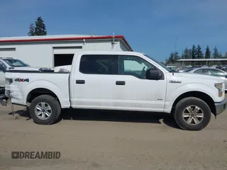 2015 Ford F-150 XLT with VIN 1FTEW1EP4FKE54734, listed as a IAAI auction lot 42137158 with 153,991 mi miles. Bid and sale history available at carsss.com. Image 13.