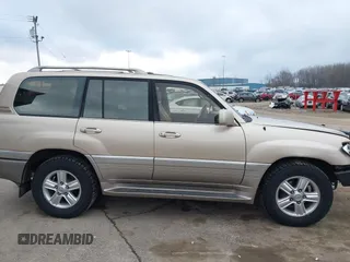 1999 Lexus LX 470 z VIN JT6HT00W8X0045705, wystawiony jako IAAI lot #42005587 z przebiegiem 443 758 mil mil oraz . Historia ofert i sprzedaży dostępna na DreamBid. Obrazek 13.