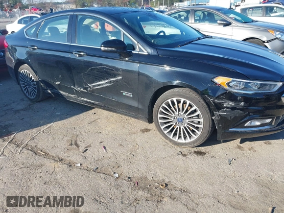 2017 Ford Fusion Titanium with VIN 3FA6P0SU2HR309895, listed as a IAAI auction lot 40963527 with 80,761 mi miles and . Bid and sale history available at DreamBid. Image 6.
