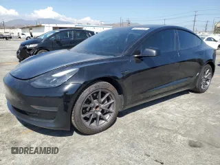 2021 Tesla Model 3 Standard Range Plus with VIN 5YJ3E1EAXMF069467, listed as a Copart auction lot 63273134 with 66,393 mi miles and Salvage Title. Bid and sale history available at carsss.com. Image 1.