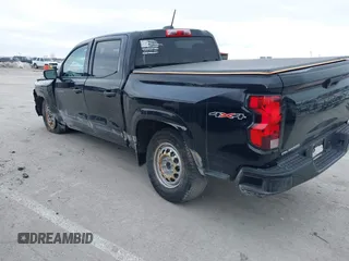 2023 Chevrolet Colorado 4WD Work Truck z VIN 1GCGTBEC4P1198879, wystawiony jako IAAI lot #41322797 z przebiegiem 13 414 mil mil oraz . Historia ofert i sprzedaży dostępna na DreamBid. Obrazek 3.
