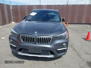 2018 BMW X1 xDrive28i with VIN WBXHT3C30J5L34702, listed as a IAAI auction lot 41935803 with 42,174 mi miles. Bid and sale history available at carsss.com. Image 12.