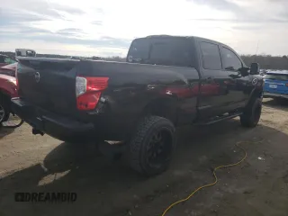 2017 Nissan Titan XD SV with VIN 1N6BA1F49HN556566, listed as a Copart auction lot 85102544 with 157,065 mi miles and Clean Title. Bid and sale history available at carsss.com. Image 3.