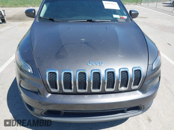 2014 Jeep Cherokee Latitude with VIN 1C4PJMCS2EW137767, listed as a IAAI auction lot 42052071 with 165,300 mi miles and . Bid and sale history available at DreamBid. Image 6.