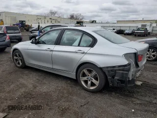 2014 BMW 3 Series 328i xDrive with VIN WBA3B5G53ENS06927, listed as a Copart auction lot 52871955 with 178,753 mi miles and Salvage Title. Bid and sale history available at DreamBid. Image 2.