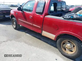2001 Ford F-150 XL with VIN 1FTRX18L91NB88500, listed as a IAAI auction lot 42096189 with Not provided miles and . Bid and sale history available at DreamBid. Image 12.
