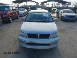 2003 Mitsubishi Lancer OZ-Rally with VIN JA3AJ86E63U022390, listed as a IAAI auction lot 41542407 with 184,639 mi miles. Bid and sale history available at carsss.com. Image 12.