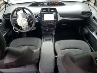 2021 Toyota Prius L Eco with VIN JTDKAMFU8M3130779, listed as a Copart auction lot 56452395 with 86,094 mi miles and Salvage title. Bid and sale history available at DreamBid. Image 8.
